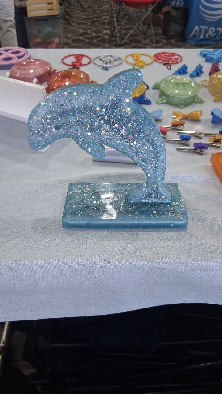 Blue dolphin handmade table decor on a base