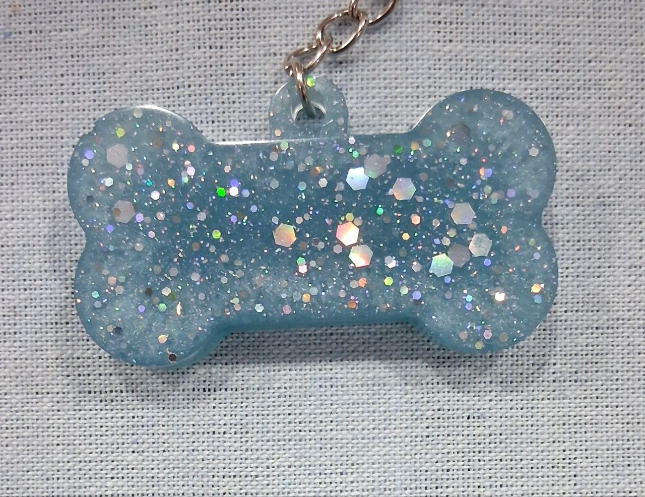 Blue glitter bone resin keychain charm